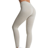 Premium threaded high waist fitness pants with hip lifting design. Quick-dry knit fabric, tight-fitting compression. Perfect for yoga and gym workouts.