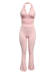 Premium halter yoga jumpsuit with elegant lace-trim detailing. High-stretch, moisture-wicking nylon fabric with flare leg design. Perfect for yoga, Pilates, dance & activewear. Shop Kincey now!