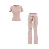 Stylish summer sports leisure suit featuring a sexy small round neck short-sleeved t-shirt and high-waist strap casual elastic boot-cut pants. Premium breathable fabric perfect for casual wear, sports & everyday activities. Shop Kincey now!