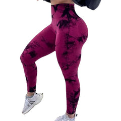 Vibrant seamless tie-dye yoga pants with high waist and peach hip lifting design. High-elastic compression leggings perfect for yoga and fitness.