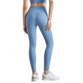 Premium nude Lycra high waist yoga pants with peach hip lifting design. Slimming compression, superior stretch, perfect for yoga and fitness training.