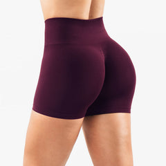 Premium seamless high waist yoga shorts with hip lifting design. Tight-fitting compression for yoga, running, and fitness. Comfortable and flattering.