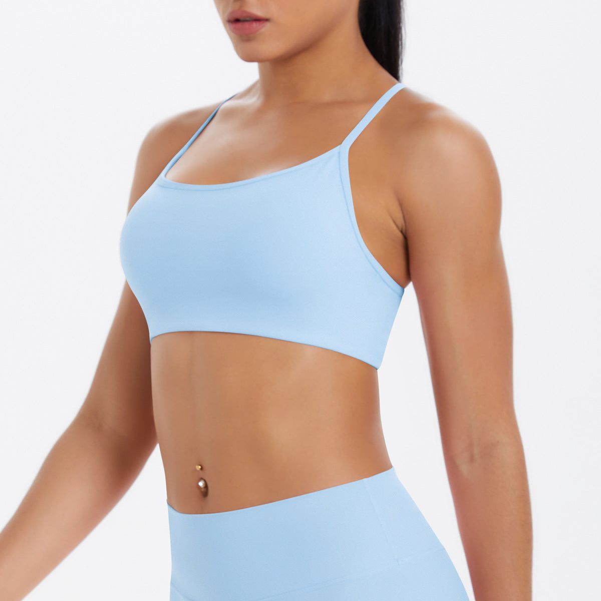 Flattering cross-back sports bra with gather design. Perfect for yoga, running, fitness. Breathable, supportive, and stylish. Available in multiple colors.