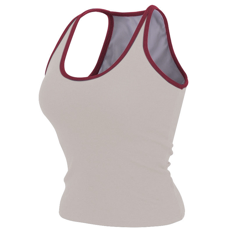 Sleeveless yoga tank with built-in bra pads for hassle-free workouts. Moisture-wicking, breathable fabric keeps you cool. Great for yoga, running, Pilates & gym sessions. Add to cart now!
