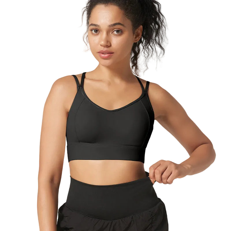 High-support strappy sports bra with beautiful back design. Shockproof, moisture-wicking, perfect for running, fitness, yoga. Available in multiple colors.