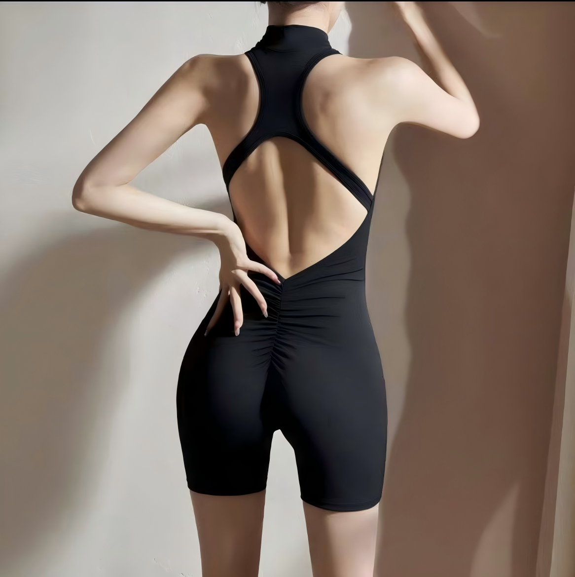 Stylish quick-dry pleated jumpsuit with high-waist hip-lifting fit. Seamless construction, front zipper for easy wear. Perfect for yoga, HIIT & gym workouts. Shop jumpsuits collection!