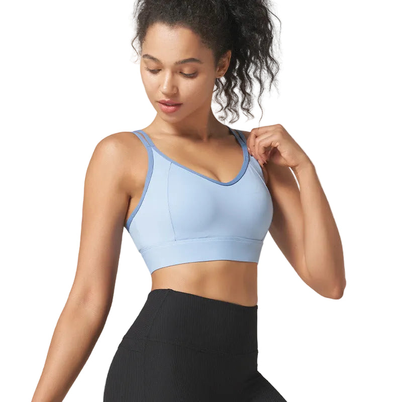 High-support strappy sports bra with beautiful back design. Shockproof, moisture-wicking, perfect for running, fitness, yoga. Available in multiple colors.