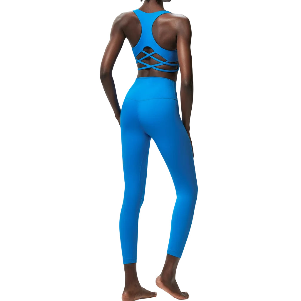 Premium Lycra fitness yoga set with quick-dry technology. Two-piece nude activewear perfect for yoga, running, and fitness training. Superior stretch and support.