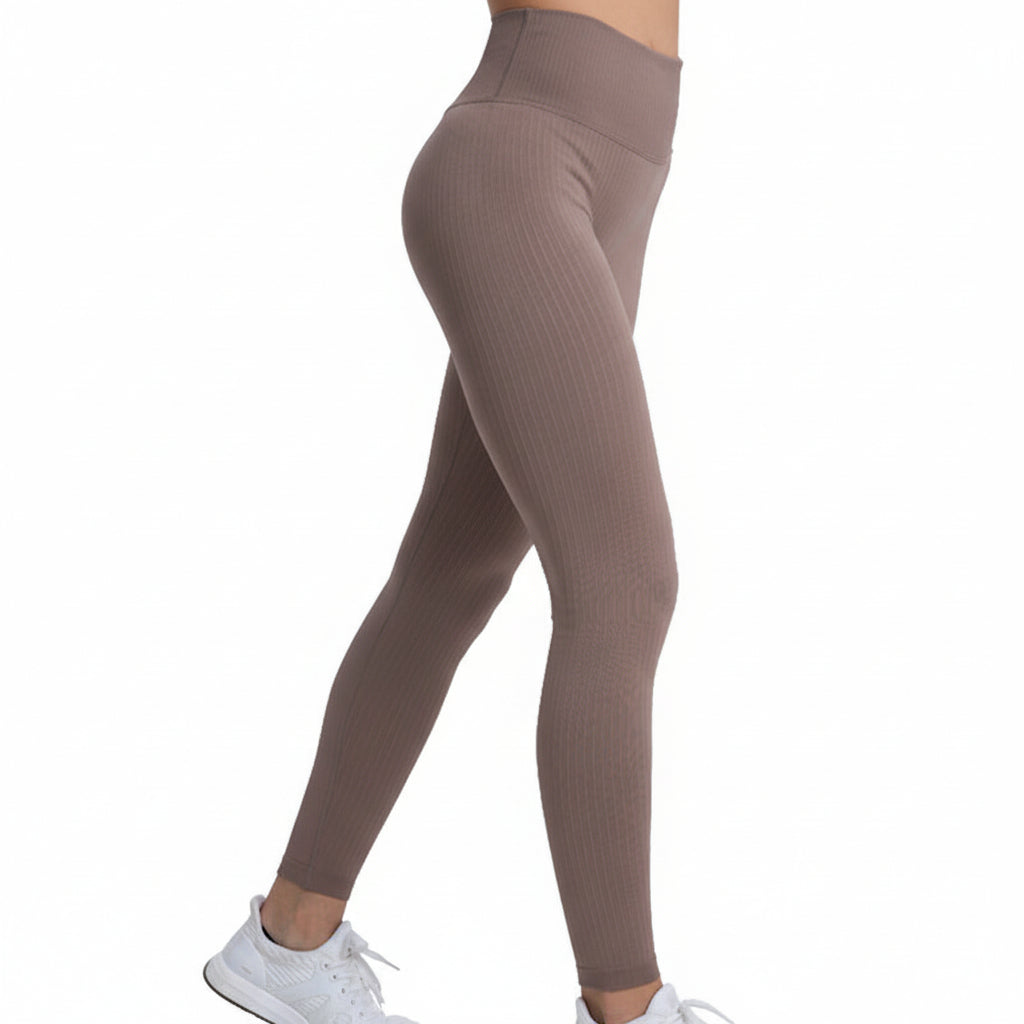 Premium threaded high waist fitness pants with hip lifting design. Quick-dry knit fabric, tight-fitting compression. Perfect for yoga and gym workouts.