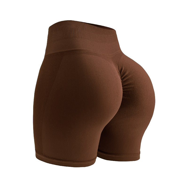 Premium seamless high waist yoga shorts with hip lifting design. Tight-fitting compression for yoga, running, and fitness. Comfortable and flattering.