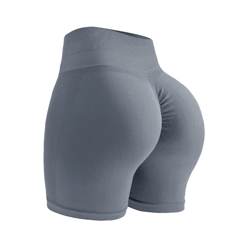 Premium seamless high waist yoga shorts with hip lifting design. Tight-fitting compression for yoga, running, and fitness. Comfortable and flattering.
