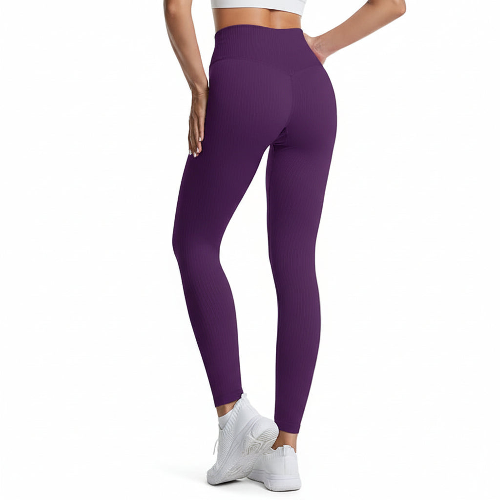 Premium threaded high waist fitness pants with hip lifting design. Quick-dry knit fabric, tight-fitting compression. Perfect for yoga and gym workouts.