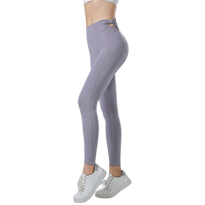 Flattering high-waist corset yoga pants with unique hip-lifting design. Double-sided brushed fabric, elegant bow detail. Ideal for yoga, running & fitness. Discover corset collection!