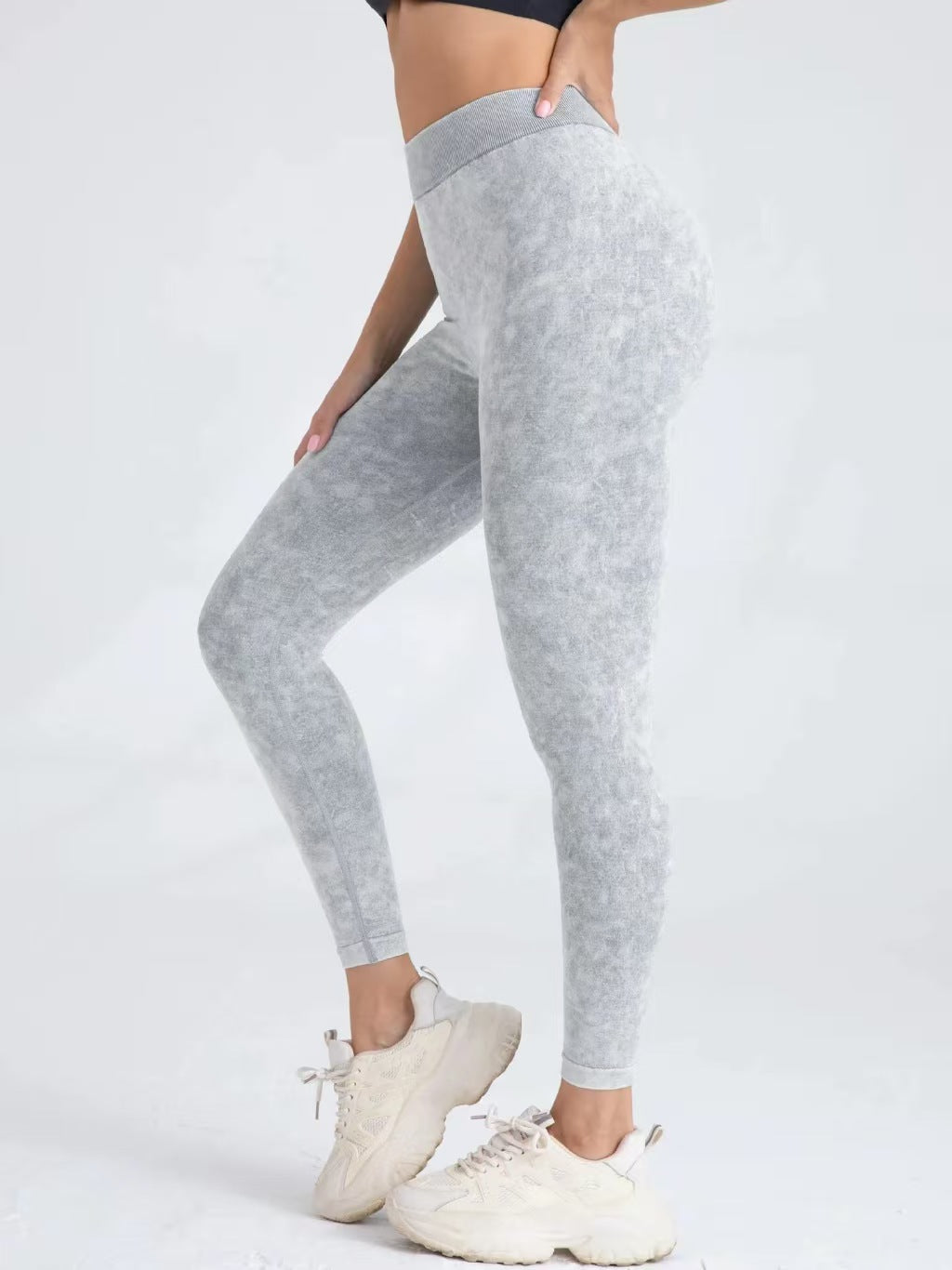Luxurious sand-washed V-waist yoga leggings with hip-lifting technology. High-elastic, moisture-wicking fabric for superior comfort. Excellent for yoga, gym & casual wear. Explore sand-washed collection!
