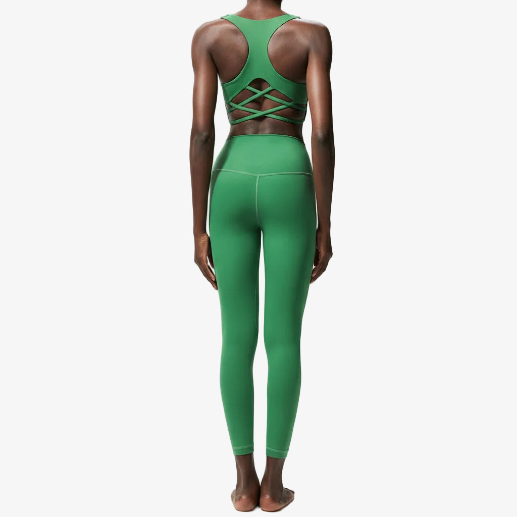 Premium Lycra fitness yoga set with quick-dry technology. Two-piece nude activewear perfect for yoga, running, and fitness training. Superior stretch and support.