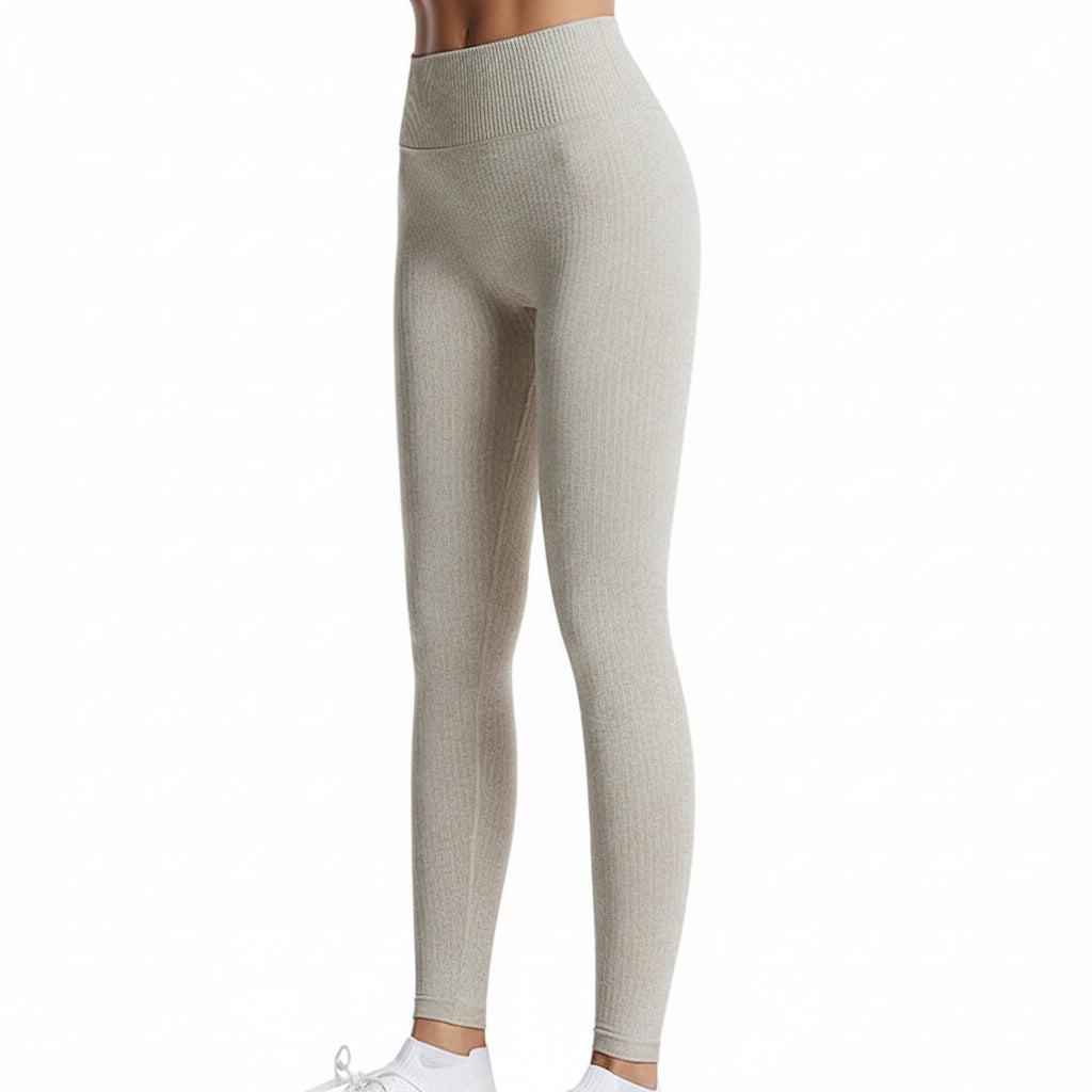 Premium threaded high waist fitness pants with hip lifting design. Quick-dry knit fabric, tight-fitting compression. Perfect for yoga and gym workouts.