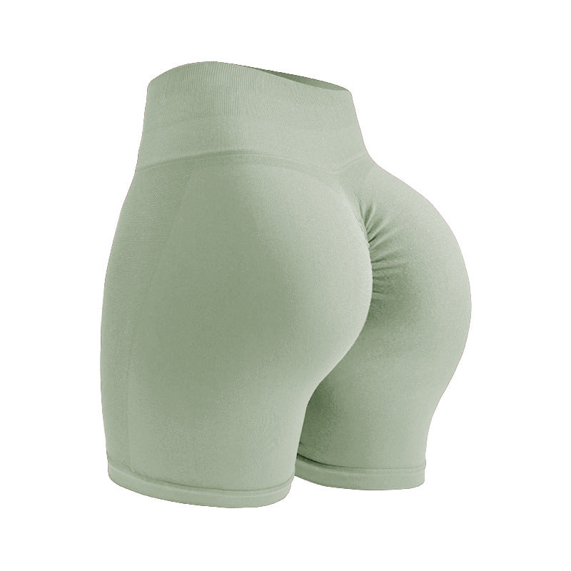Premium seamless high waist yoga shorts with hip lifting design. Tight-fitting compression for yoga, running, and fitness. Comfortable and flattering.