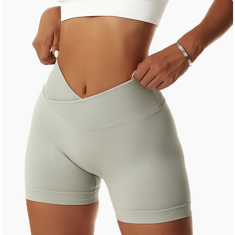 Versatile seamless V-waist yoga shorts with high-waist compression. Quick-dry, breathable fabric perfect for hot yoga, running & summer workouts. Perfect for summer - shop now!