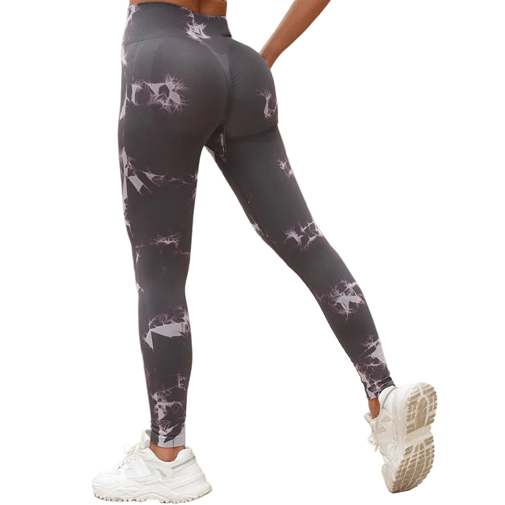 Vibrant seamless tie-dye yoga pants with high waist and peach hip lifting design. High-elastic compression leggings perfect for yoga and fitness.