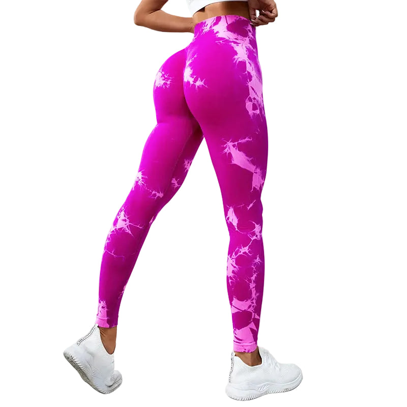 Vibrant seamless tie-dye yoga pants with high waist and peach hip lifting design. High-elastic compression leggings perfect for yoga and fitness.