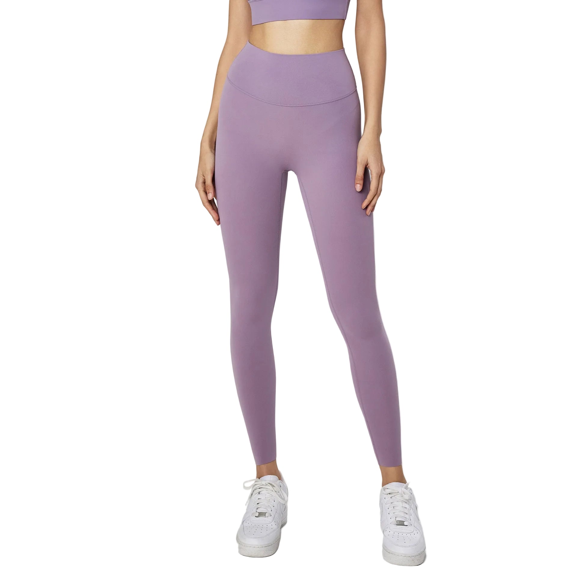 Premium nude Lycra high waist yoga pants with peach hip lifting design. Slimming compression, superior stretch, perfect for yoga and fitness training.