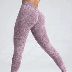 Luxurious sand-washed V-waist yoga leggings with hip-lifting technology. High-elastic, moisture-wicking fabric for superior comfort. Excellent for yoga, gym & casual wear. Explore sand-washed collection!