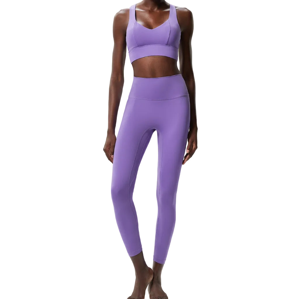 Premium Lycra fitness yoga set with quick-dry technology. Two-piece nude activewear perfect for yoga, running, and fitness training. Superior stretch and support.
