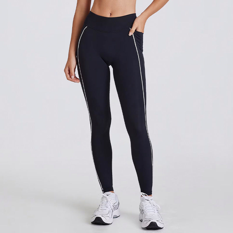 Kincey women's yoga activewear set: V-neck halter sports bra with matching shorts or leggings. Contrast stripe design, sizes S–XL. Shop yoga, gym & athleisure.