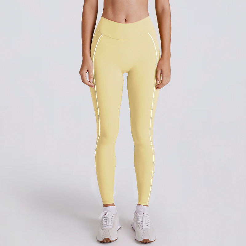 Kincey women's yoga activewear set: V-neck halter sports bra with matching shorts or leggings. Contrast stripe design, sizes S–XL. Shop yoga, gym & athleisure.