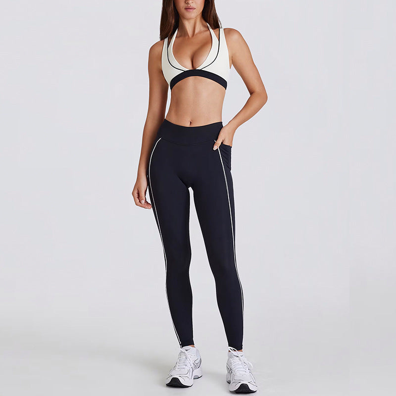 Kincey women's yoga activewear set: V-neck halter sports bra with matching shorts or leggings. Contrast stripe design, sizes S–XL. Shop yoga, gym & athleisure.