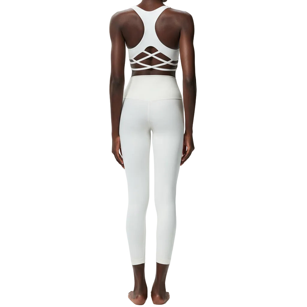 Premium Lycra fitness yoga set with quick-dry technology. Two-piece nude activewear perfect for yoga, running, and fitness training. Superior stretch and support.