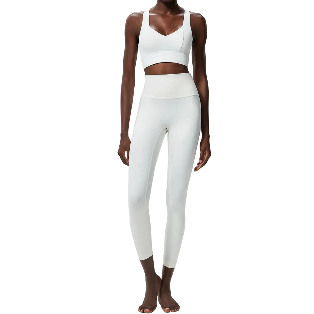 Premium Lycra fitness yoga set with quick-dry technology. Two-piece nude activewear perfect for yoga, running, and fitness training. Superior stretch and support.