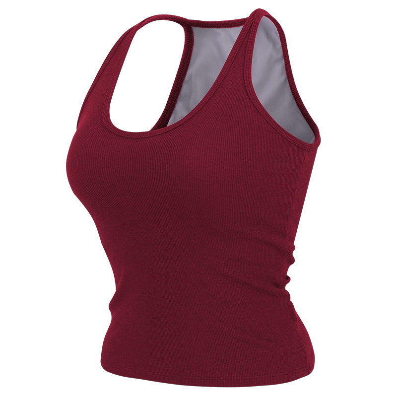 Sleeveless yoga tank with built-in bra pads for hassle-free workouts. Moisture-wicking, breathable fabric keeps you cool. Great for yoga, running, Pilates & gym sessions. Add to cart now!