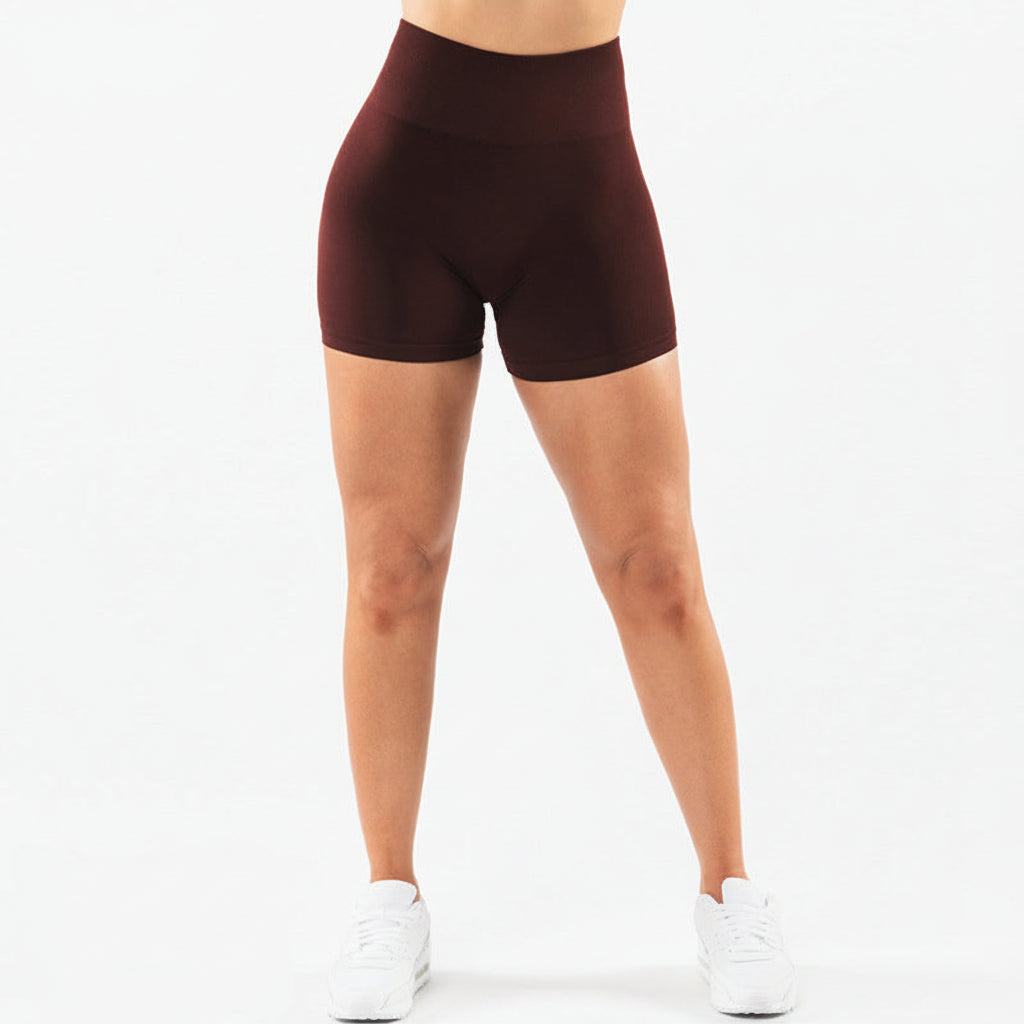 Premium seamless high waist yoga shorts with hip lifting design. Tight-fitting compression for yoga, running, and fitness. Comfortable and flattering.